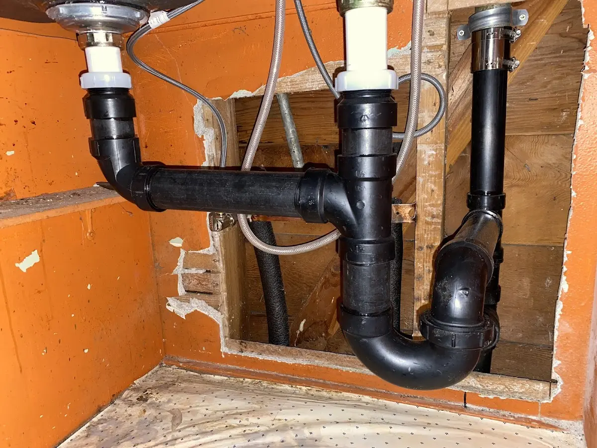 Professional Garbage Disposal Repair equipment and tools on the job in Richfield